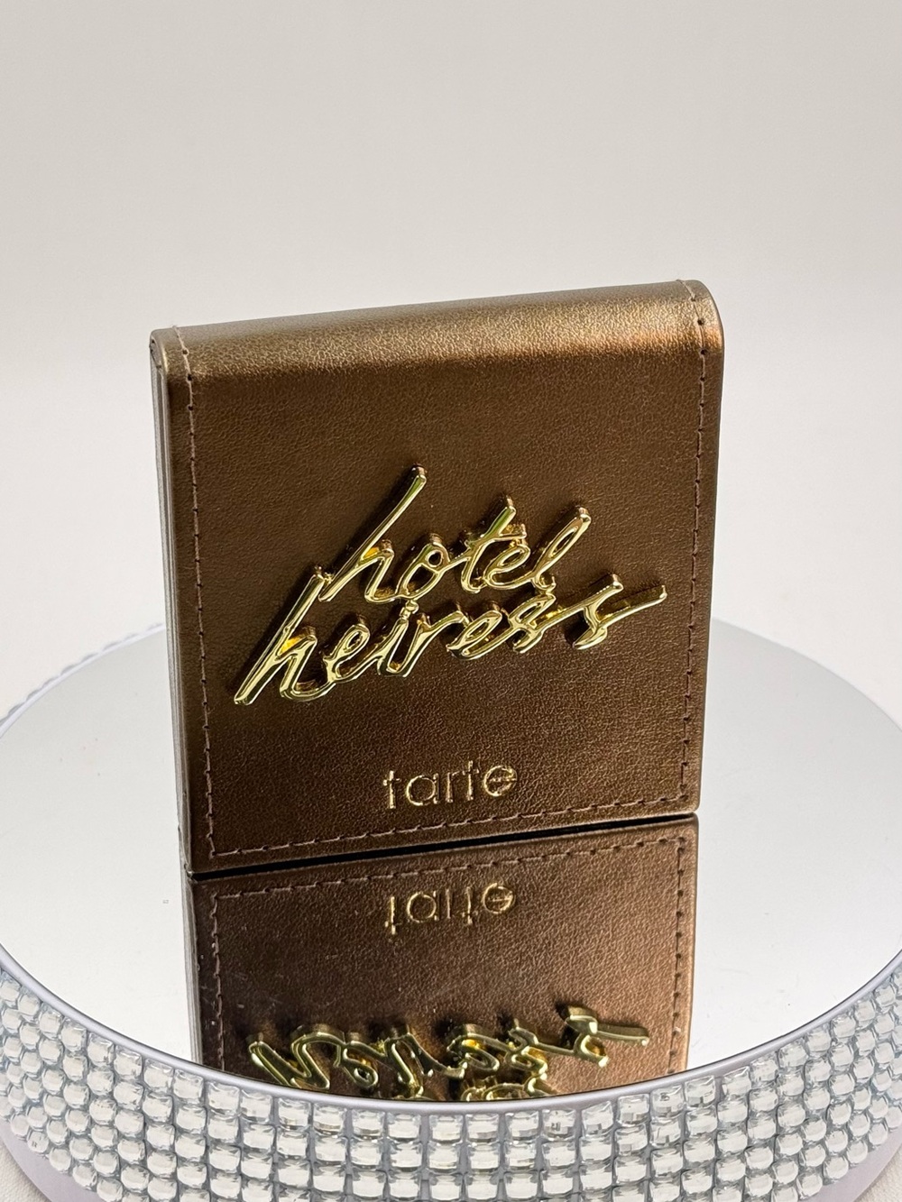 tarte Metallic Bronze Compact with Gold Script Logo